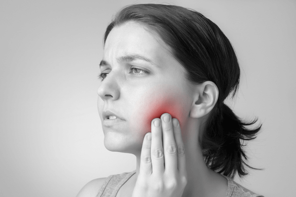 inflamação após extração de dente